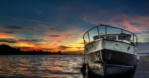 boat with a sunset in the background