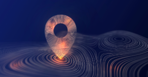 Dark blue photo with image of a orange, glowing location symbol