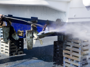 photo of a boat being cleaned