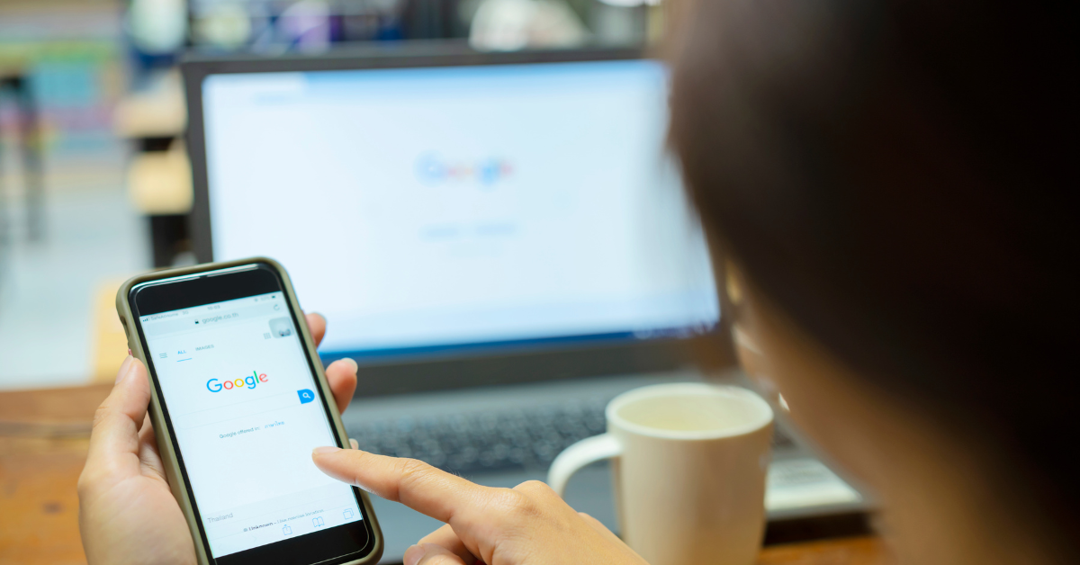 A phone and a laptop on Google