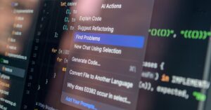 A close-up of a computer screen showing a code editor with a pop-up menu titled "AI Actions." The option "Find Problems" is highlighted in blue among other AI-assisted coding tools.